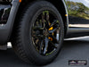 Wheel and tire detail of Rivian R2 with gloss black AW10 20x8.5 forged wheels and Michelin X-ICE SNOW 255/60 tires