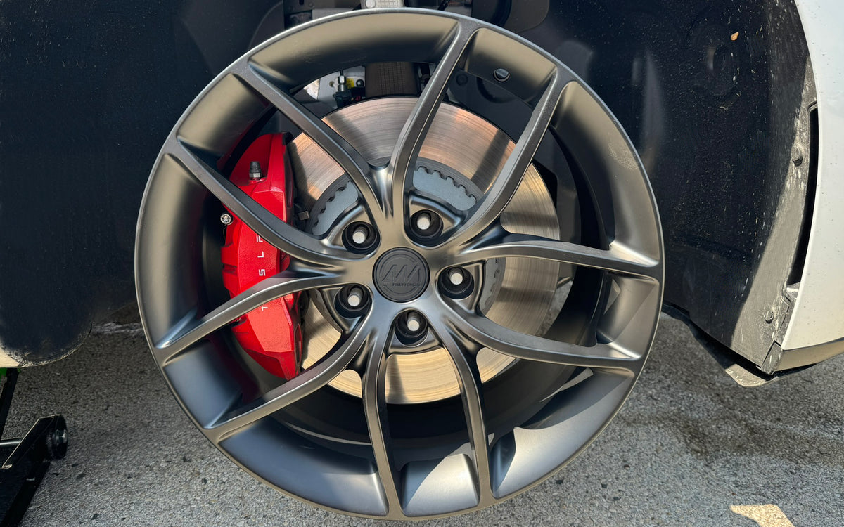 AW21 wheel showing clearance around the Tesla Performance brake caliper