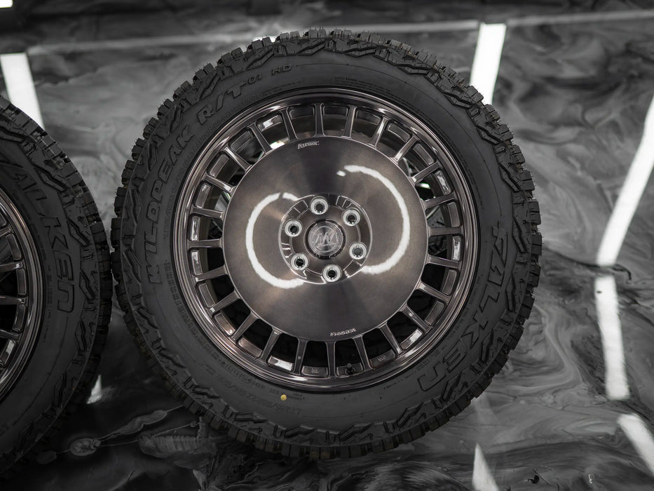 22-Inch AWDX Gloss Brushed Grey Wheels + Falken Wildpeak R/T LT285/55 R22 Tire Set for Tesla Cybertruck (DEMO SET)