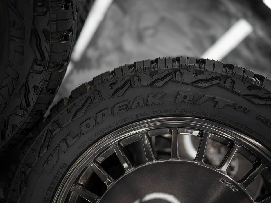 22-Inch AWDX Gloss Brushed Grey Wheels + Falken Wildpeak R/T LT285/55 R22 Tire Set for Tesla Cybertruck (DEMO SET)