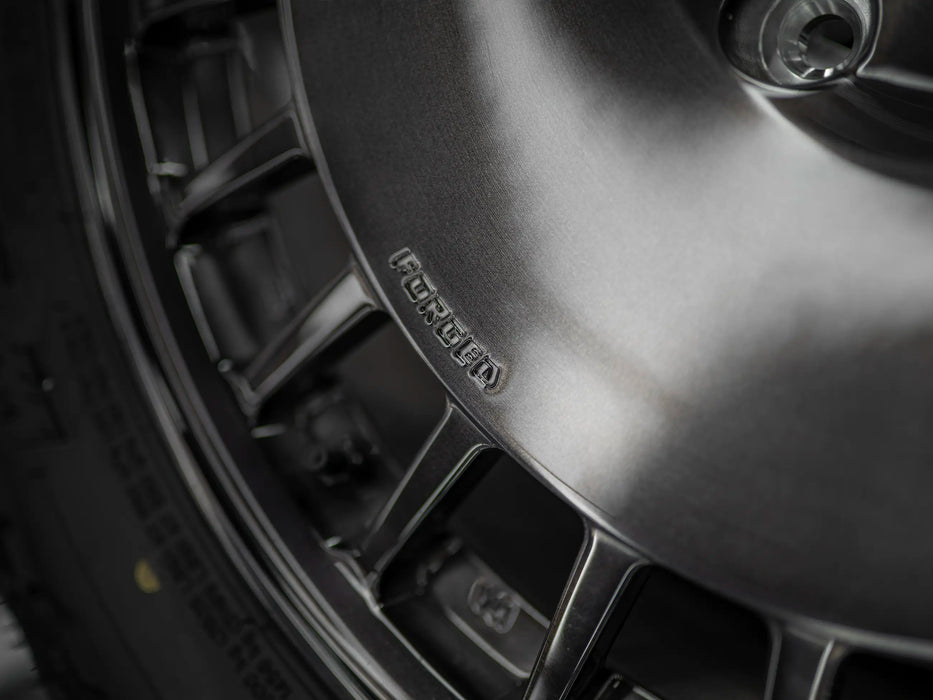 22-Inch AWDX Gloss Brushed Grey Wheels + Falken Wildpeak R/T LT285/55 R22 Tire Set for Tesla Cybertruck (DEMO SET)