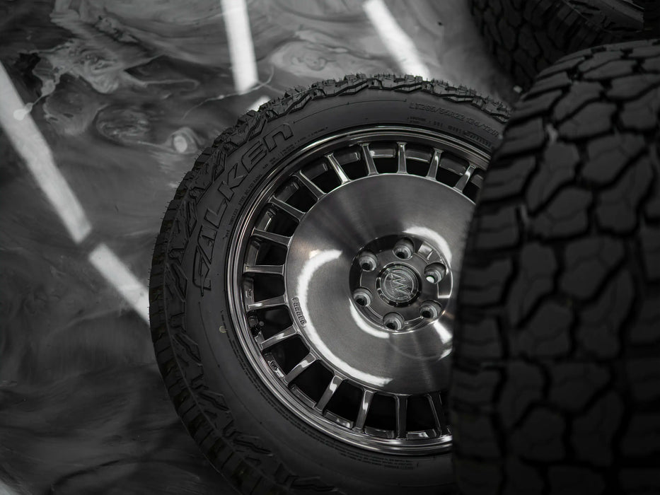 22-Inch AWDX Gloss Brushed Grey Wheels + Falken Wildpeak R/T LT285/55 R22 Tire Set for Tesla Cybertruck (DEMO SET)