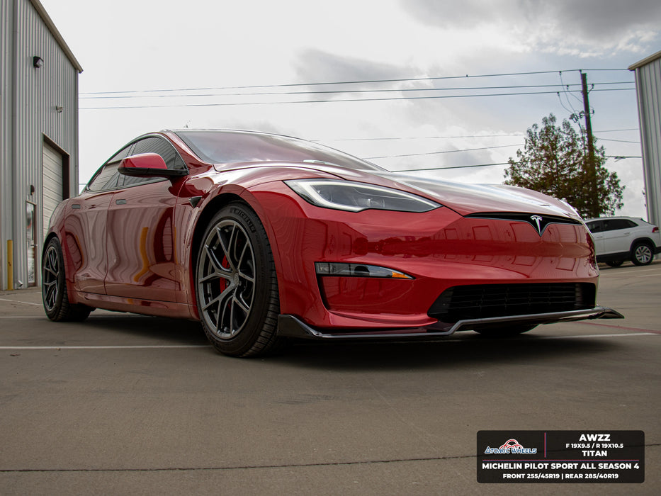 Low front three-quarter view of red Tesla Model S Long Range with titan AWZZ forged wheels, 19x9.5 front and 19x10.5 rear, and Michelin Pilot Sport All Season 4 tires