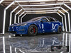 Low front three-quarter view of blue Tesla Model S Plaid with gloss black AWZZ forged wheels, 19x9.5 front and 19x10.5 rear, and Goodyear ElectricDrive 2 tires