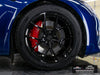 Front wheel close-up of blue Tesla Model S Plaid with gloss black AWZZ forged wheels, 19x9.5 front and 19x10.5 rear, and Goodyear ElectricDrive 2 tires