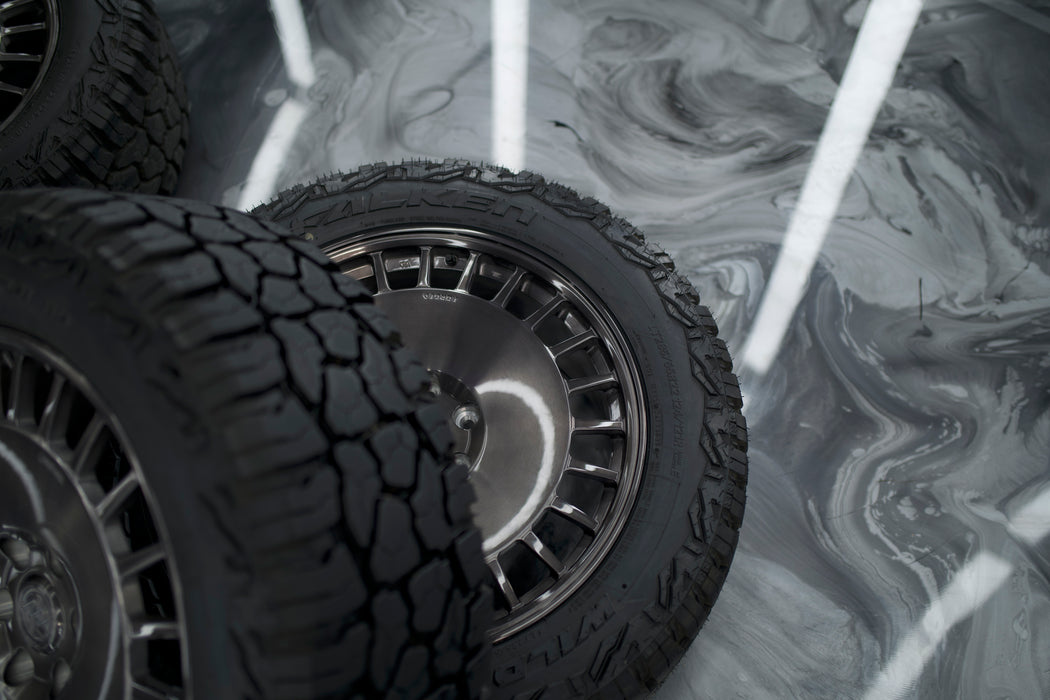 22-Inch AWDX Gloss Brushed Grey Wheels + Falken Wildpeak R/T LT285/55 R22 Tire Set for Tesla Cybertruck (DEMO SET)